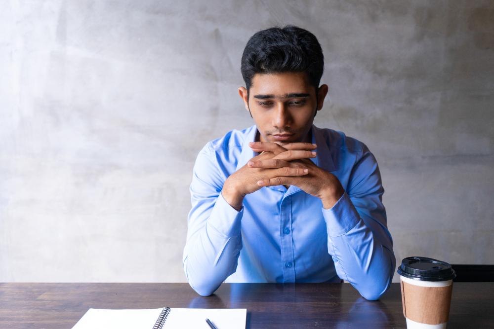 A man in a depressed state.